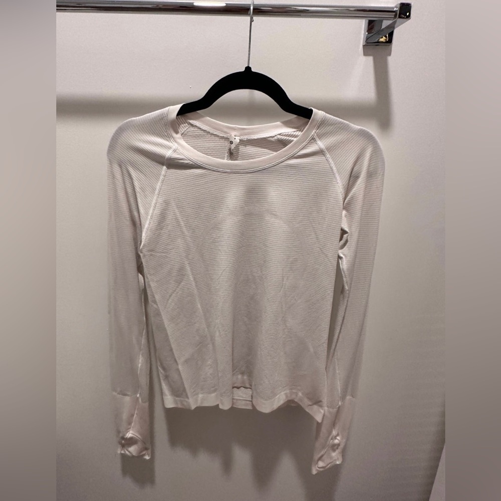 Size 8 LULULEMON white long sleeve, swiftly tech